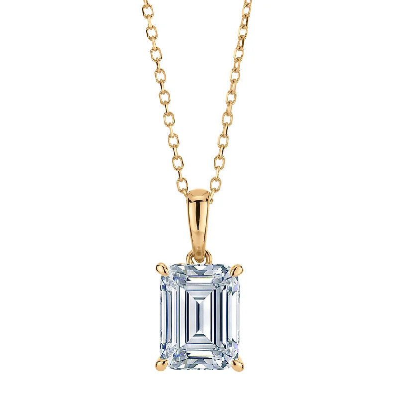 Women’s fashionable necklace-Emerald Cut and Round Brilliant solitaire pendant with 1.81 carats* of diamond simulants in 10 carat yellow gold