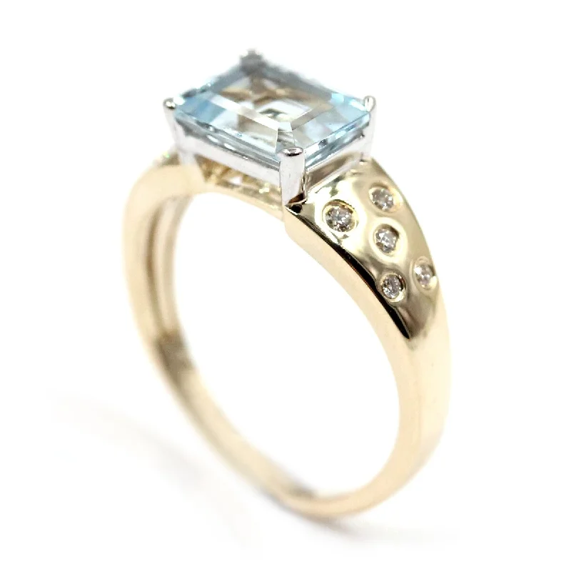 Women’s statement ring-14Kt Yellow Gold Aquamarine and Diamond Ring